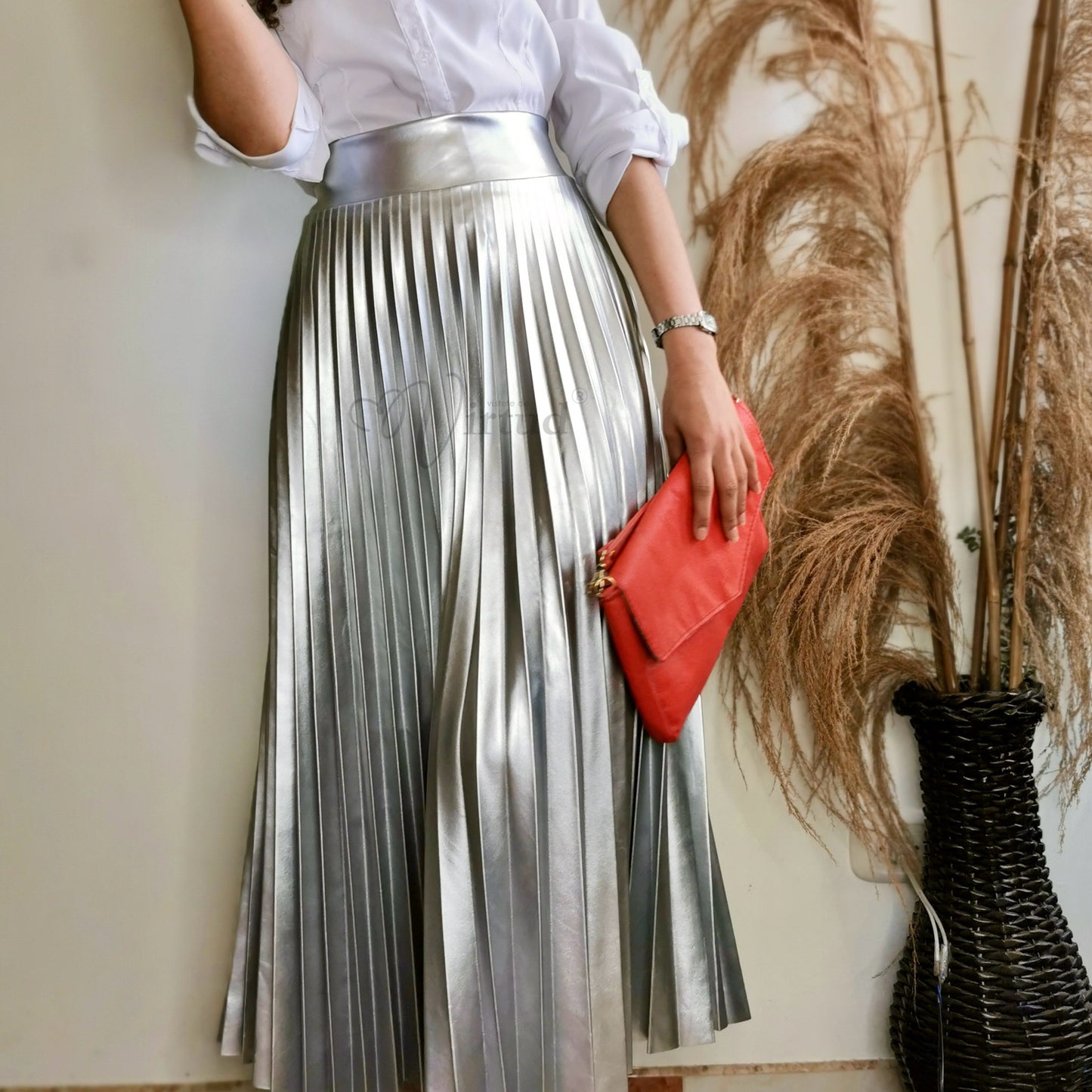 Falda plisada cuerotex larga